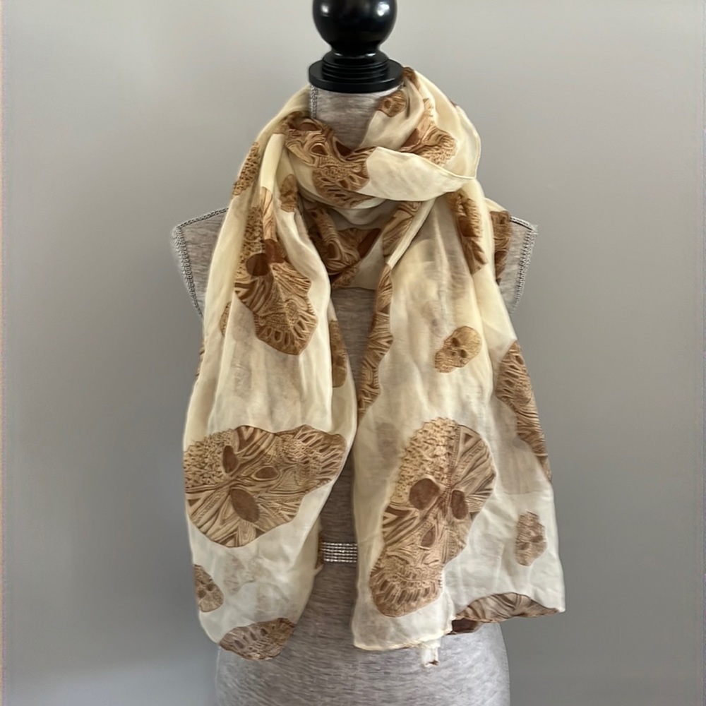 Italy Design 100 % polyester super lightweight and flows.  Has a skull design.